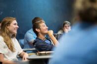 Student in English class smiling